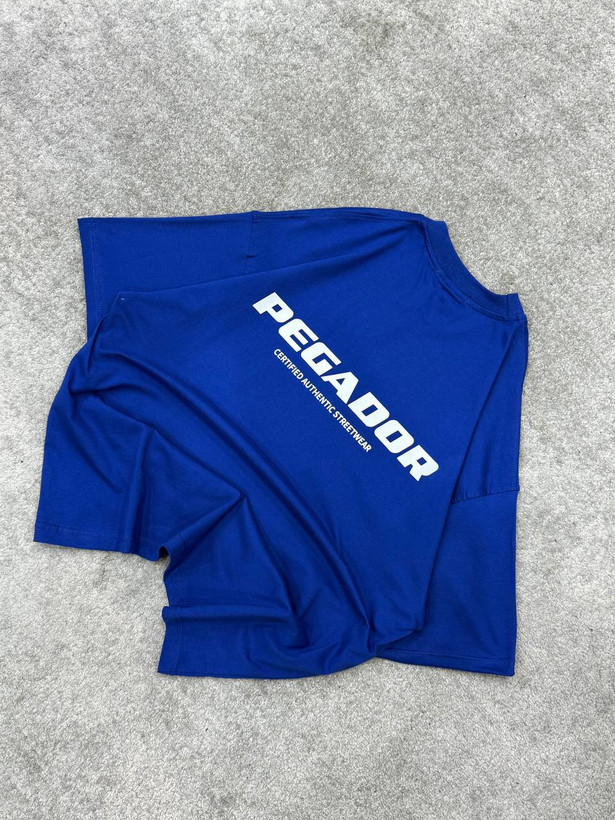 تیشرت پگادور آبی کاربنی با چاپ سفید و پارچه نرم و راحت